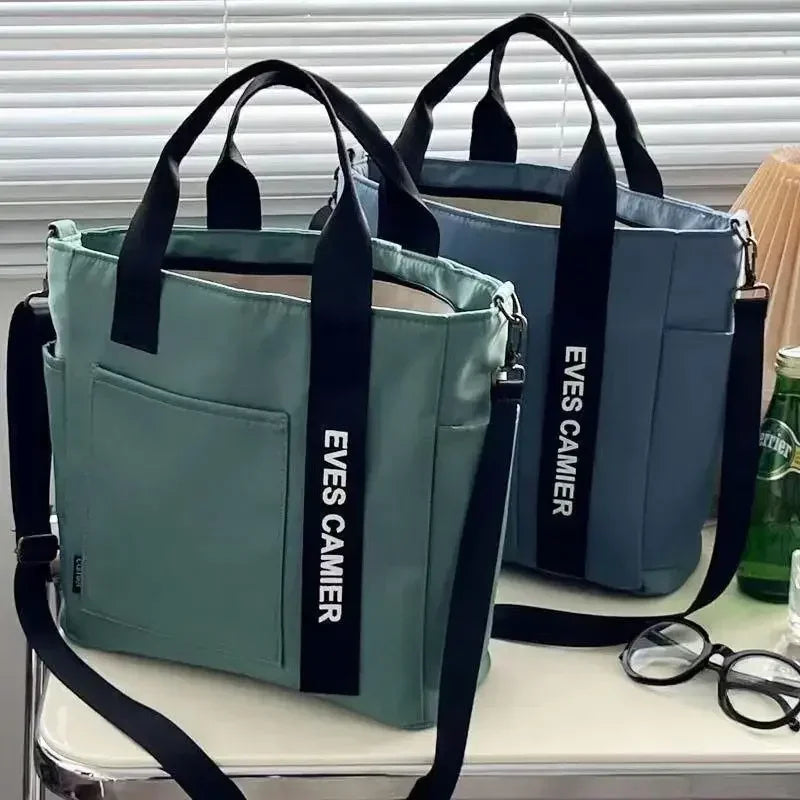 Nova Mala de Ombro Casual de Grande Capacidade em Nylon Impermeável de Lona, ​​Bolsa de Mão Simples e Moderna para Estudantes