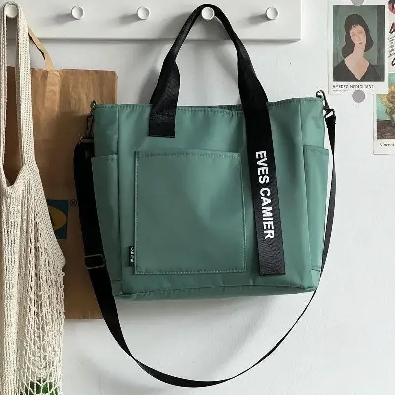 Nova Mala de Ombro Casual de Grande Capacidade em Nylon Impermeável de Lona, ​​Bolsa de Mão Simples e Moderna para Estudantes