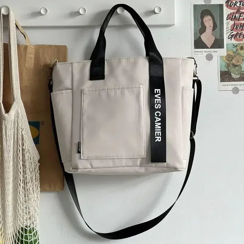 Nova Mala de Ombro Casual de Grande Capacidade em Nylon Impermeável de Lona, ​​Bolsa de Mão Simples e Moderna para Estudantes