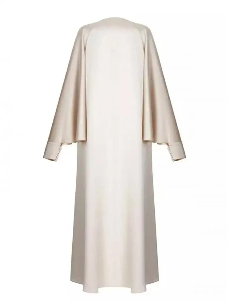 Vestido de Noite Comprido Mulher Muçulmana de Cor Sólida Gola Redonda Manga Comprida Asa de Morcego Solta com Abertura até ao Chão