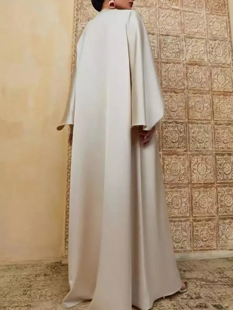 Vestido de Noite Comprido Mulher Muçulmana de Cor Sólida Gola Redonda Manga Comprida Asa de Morcego Solta com Abertura até ao Chão