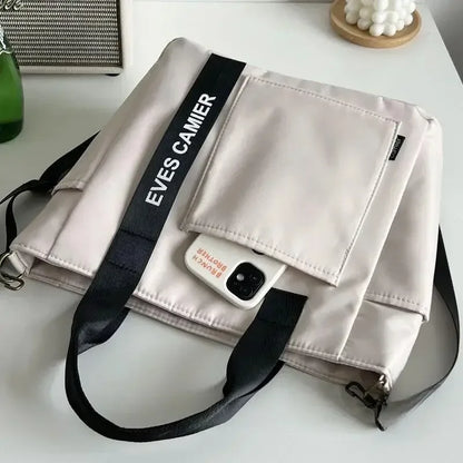 Nova Mala de Ombro Casual de Grande Capacidade em Nylon Impermeável de Lona, ​​Bolsa de Mão Simples e Moderna para Estudantes